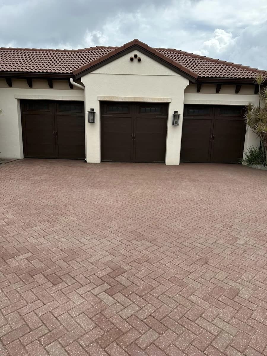 Gray paver driveway after KB Sealing's clean and seal